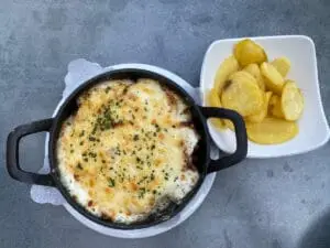 Kolossos Schlemmermeile Gericht mit Scheibenkartoffeln 2021